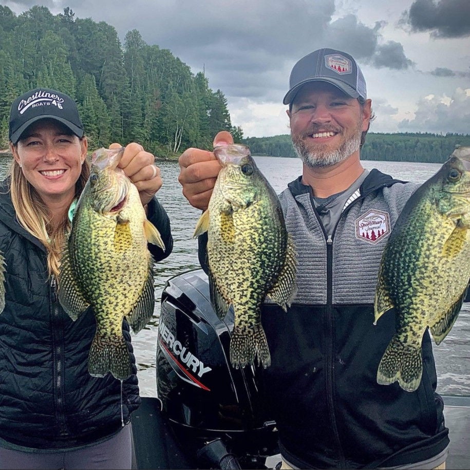 Tyler and Sara Trample showing off their catch